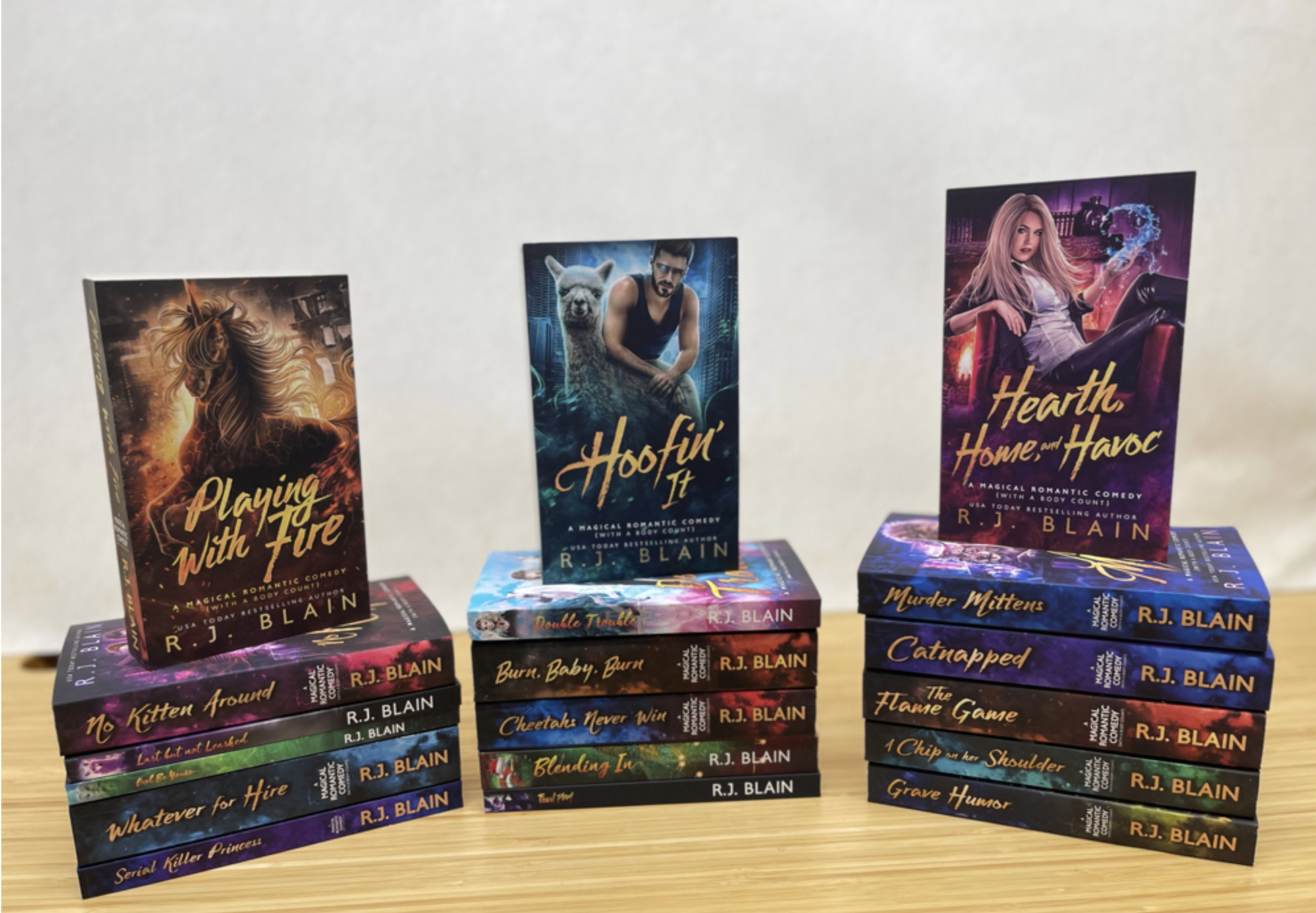 SFWA Charity Auction for a signed collection of the Magical Romantic Comedy (with a body count) series: 18 books! (Up to Catnapped.)